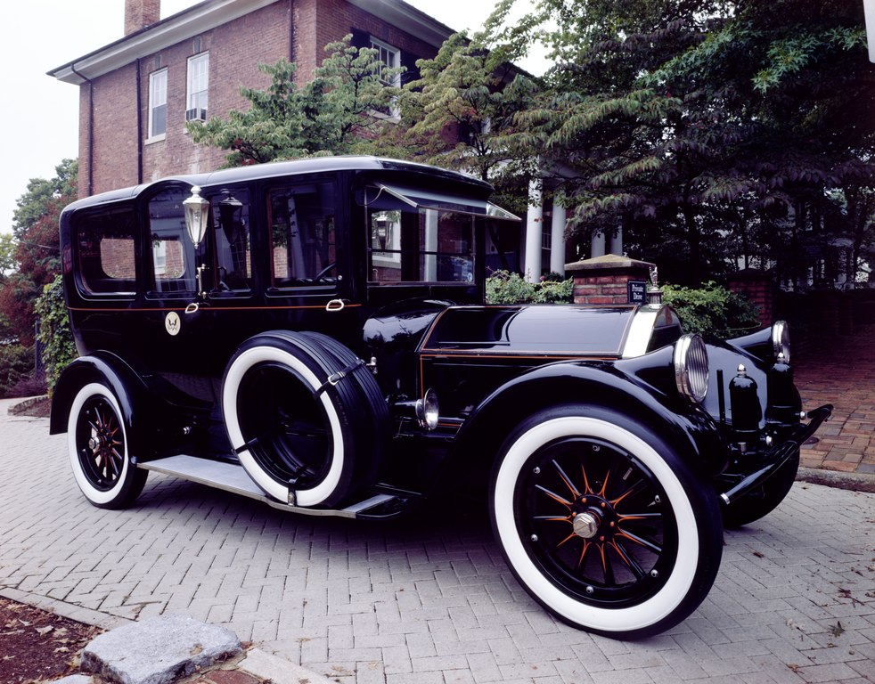 A close-up photo of a Pierce-Arrow car parked in a parking lot