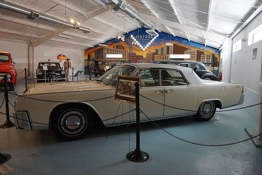 A close-up photo of a Lincoln Continental Convertible car on display at an exhibition