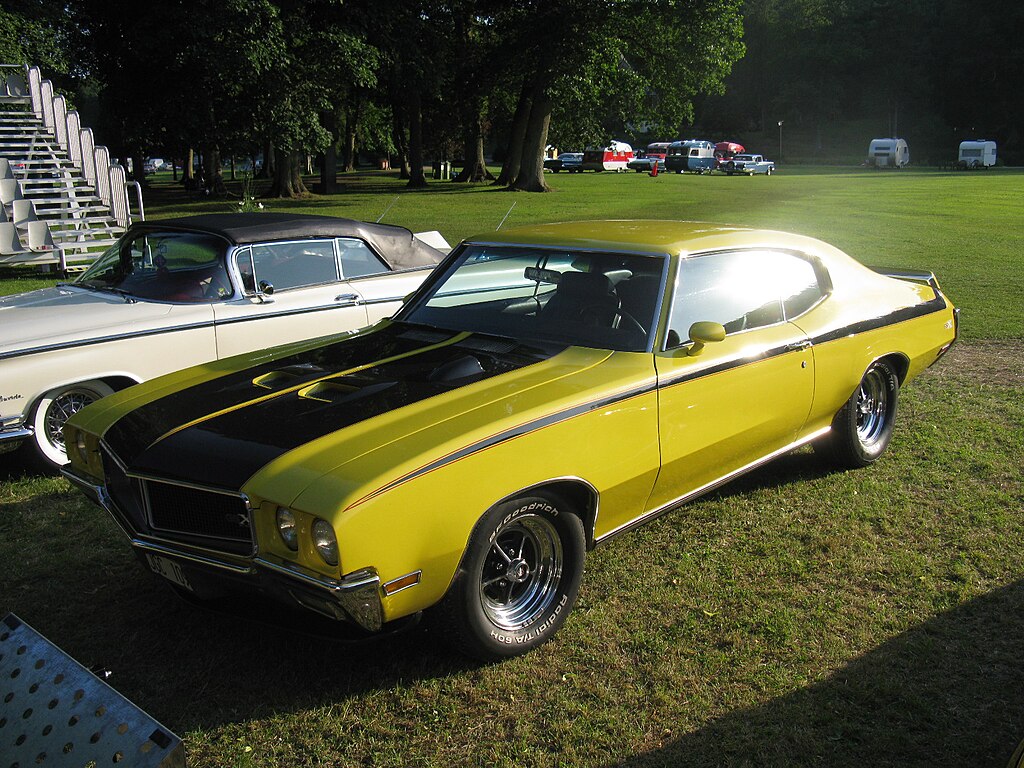 A close-up photo of a Buick GSX 1970 car on display at an exhibition