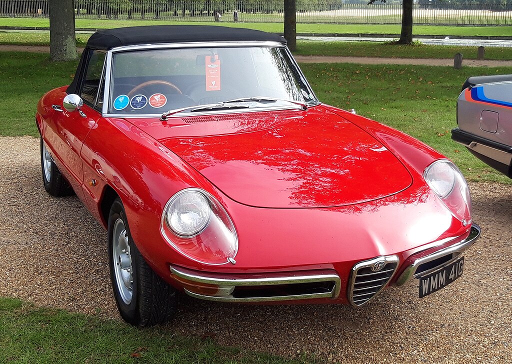 1966 Alfa Romeo Spider car on display at an exhibition