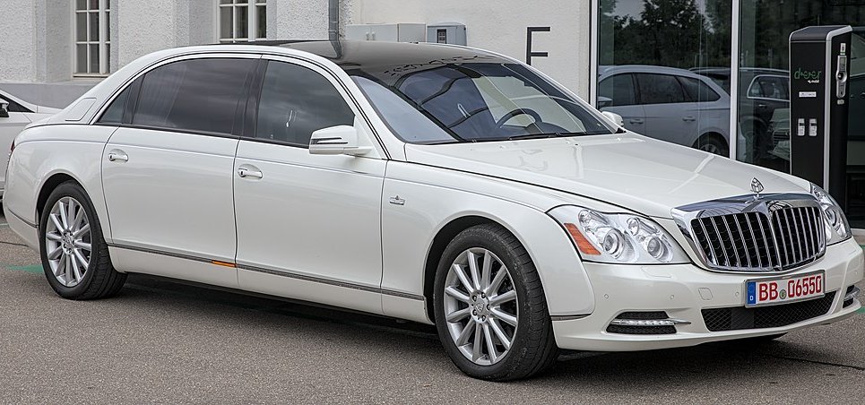 A close-up photo of a Maybach 62 S Landaulet car parked on a city street