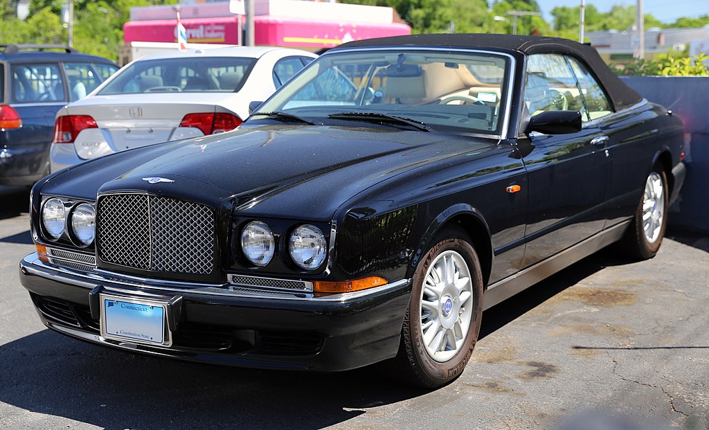 A close-up photo of a 1998 Bentley Azure car parked in a parking lot