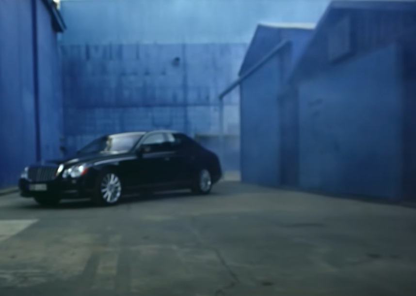 A visually captivating still taken from a pivotal moment in the music video Otis