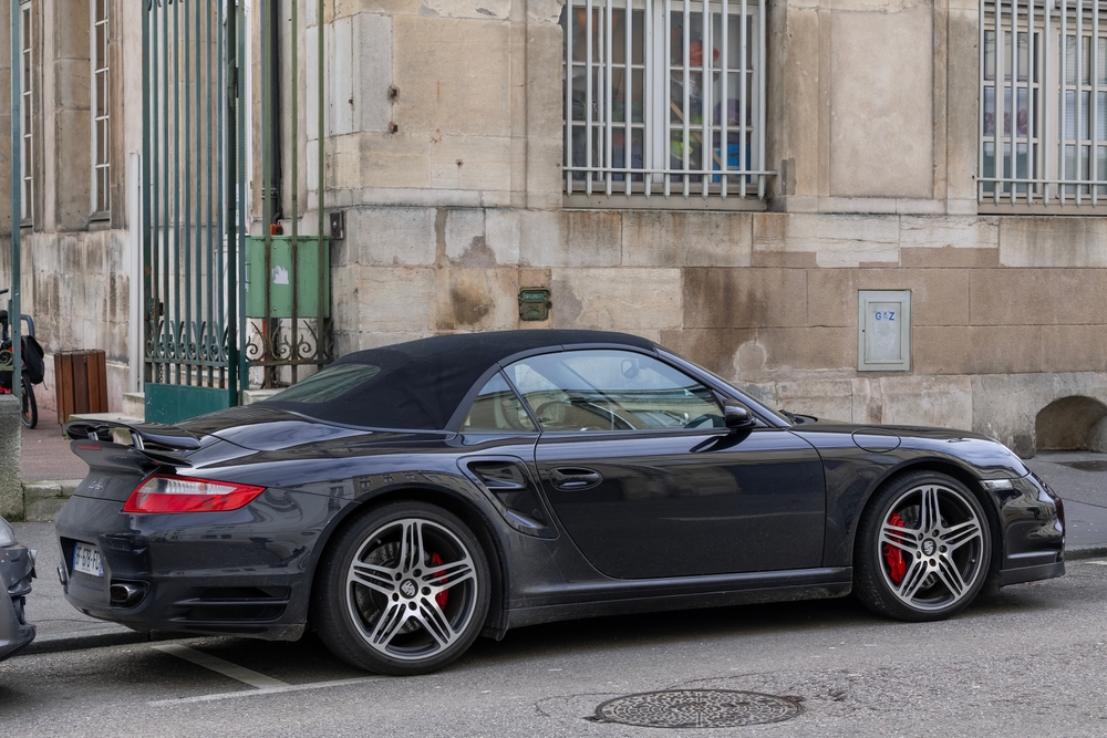 Focus on a black Porsche 997 Turbo Cabriolet