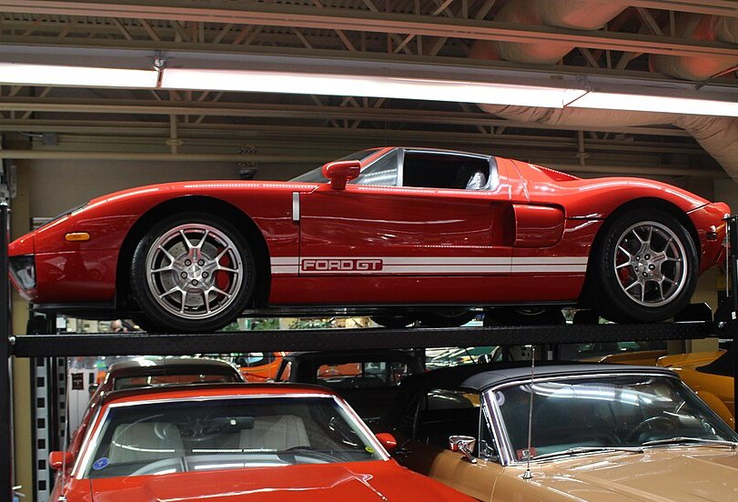 A close-up photo of a 2005 Ford GT car on display at an exhibition