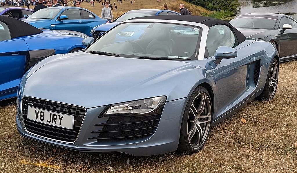 2011 Audi R8 Spyder car on display at an exhibition