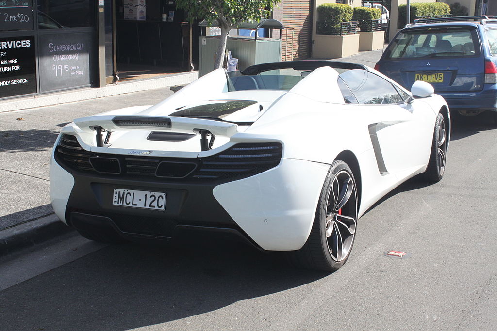 2012 McLaren MP4-12C car parked on a city street