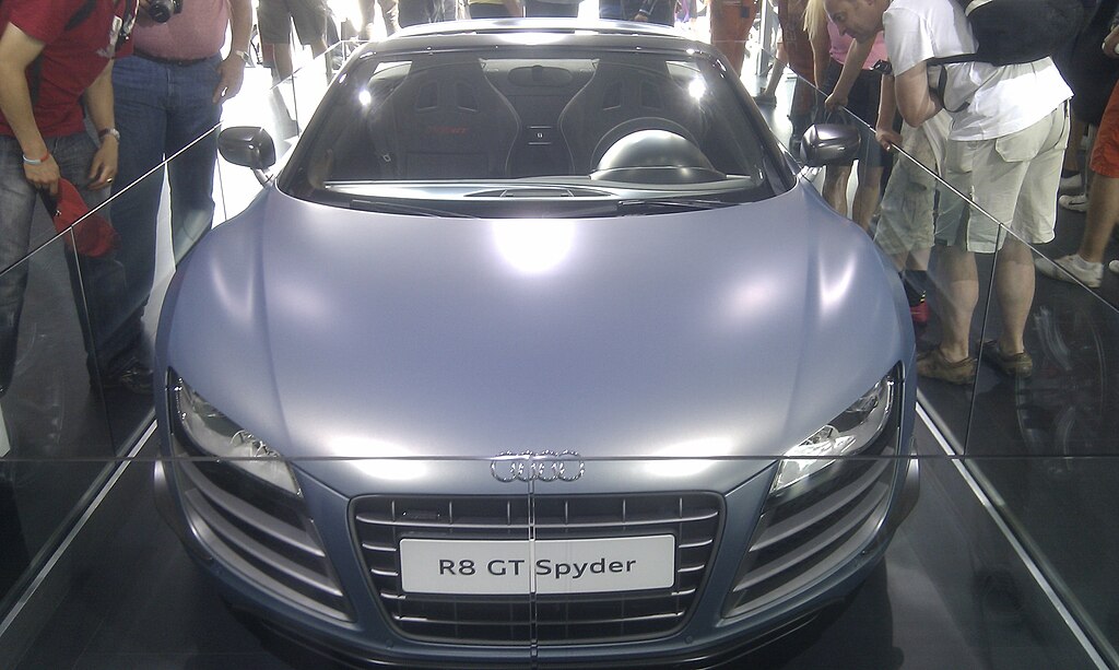 2011 Audi R8 Spyder car on display at an exhibition