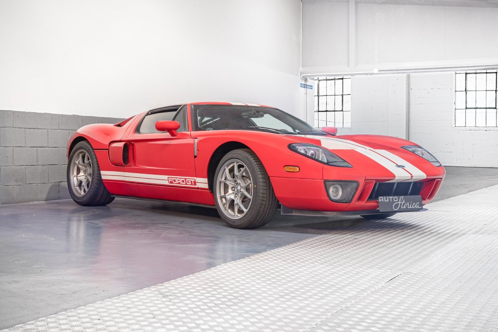 A close-up photo of a 2005 Ford GT car on display at an exhibition