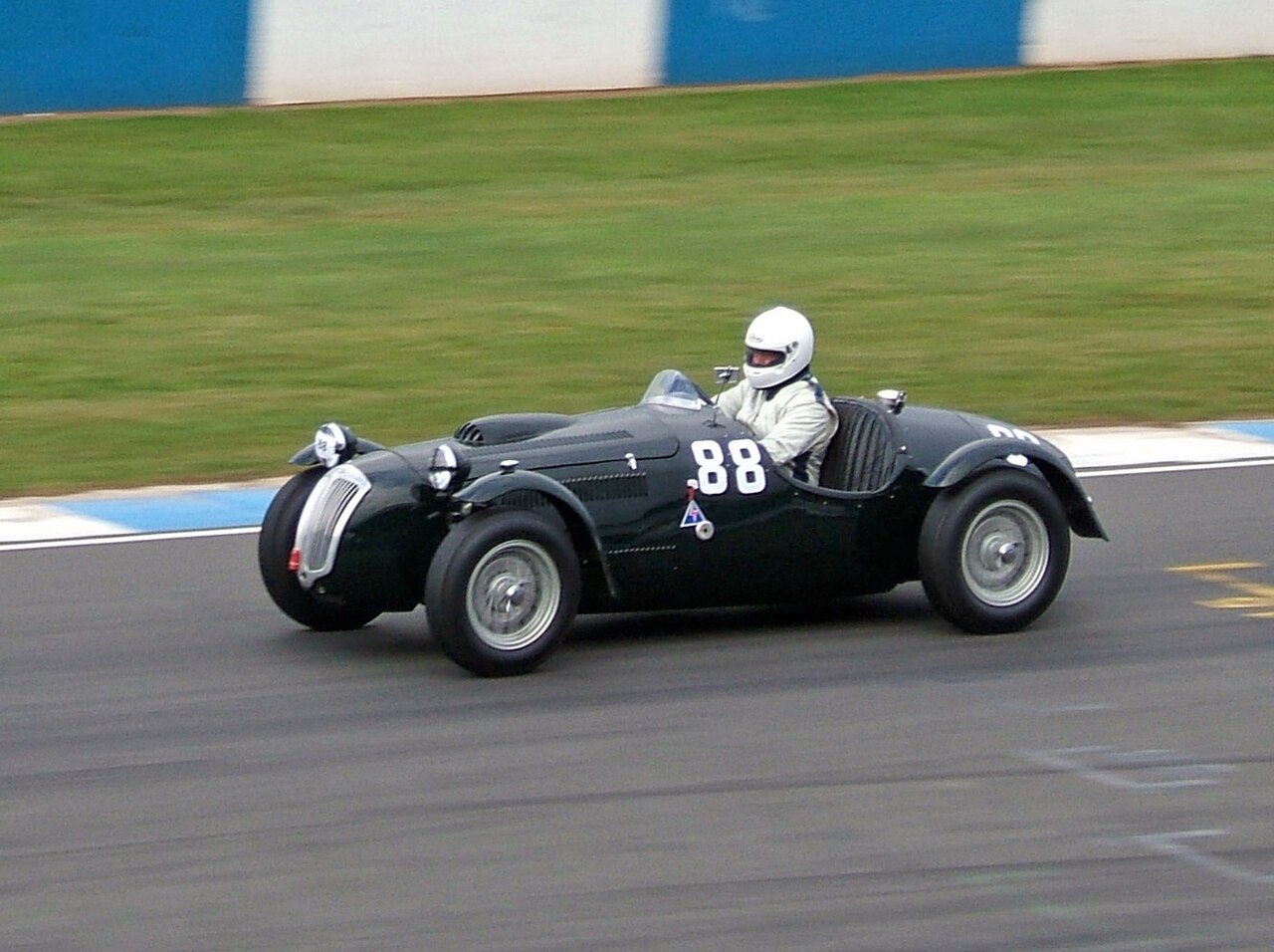 Richard Lake accelerates his Frazer Nash Le Mans Mk2 out of the chicane