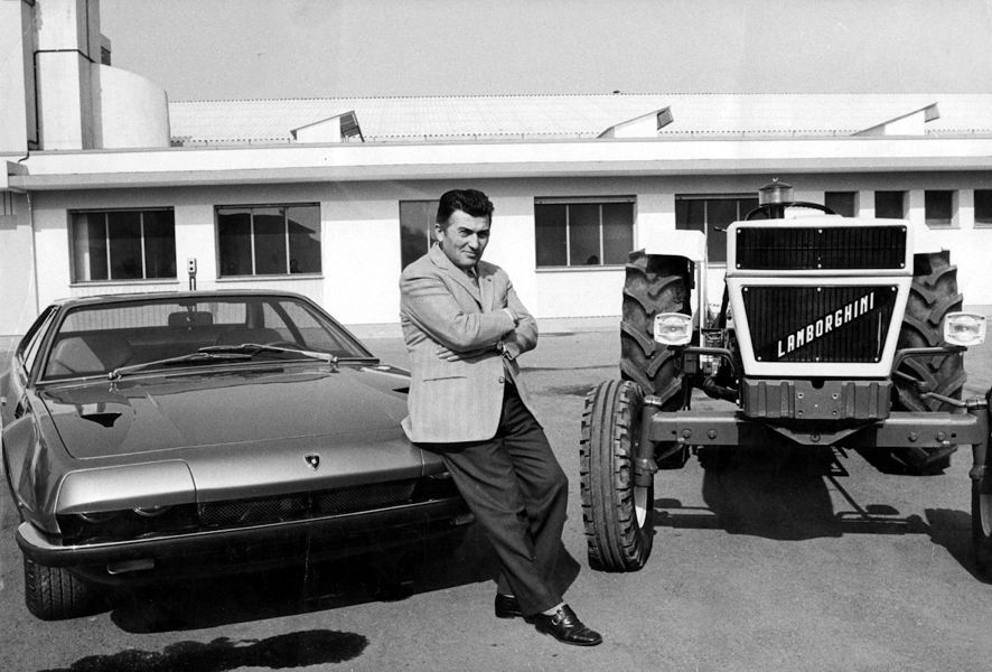 1970s Ferruccio Lamborghini photographed between a tractor and a Lamborghini car