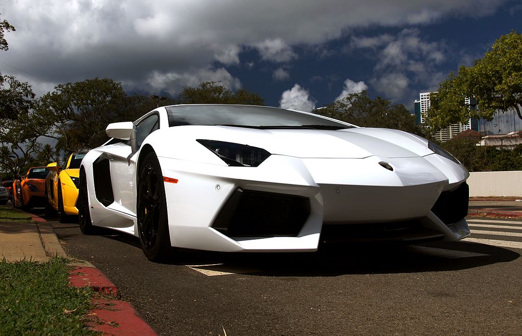 White Lamborghini on the road.
