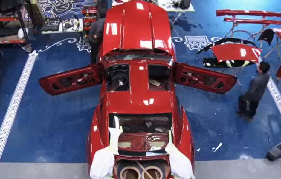 Top view of a custom made car in a garage
