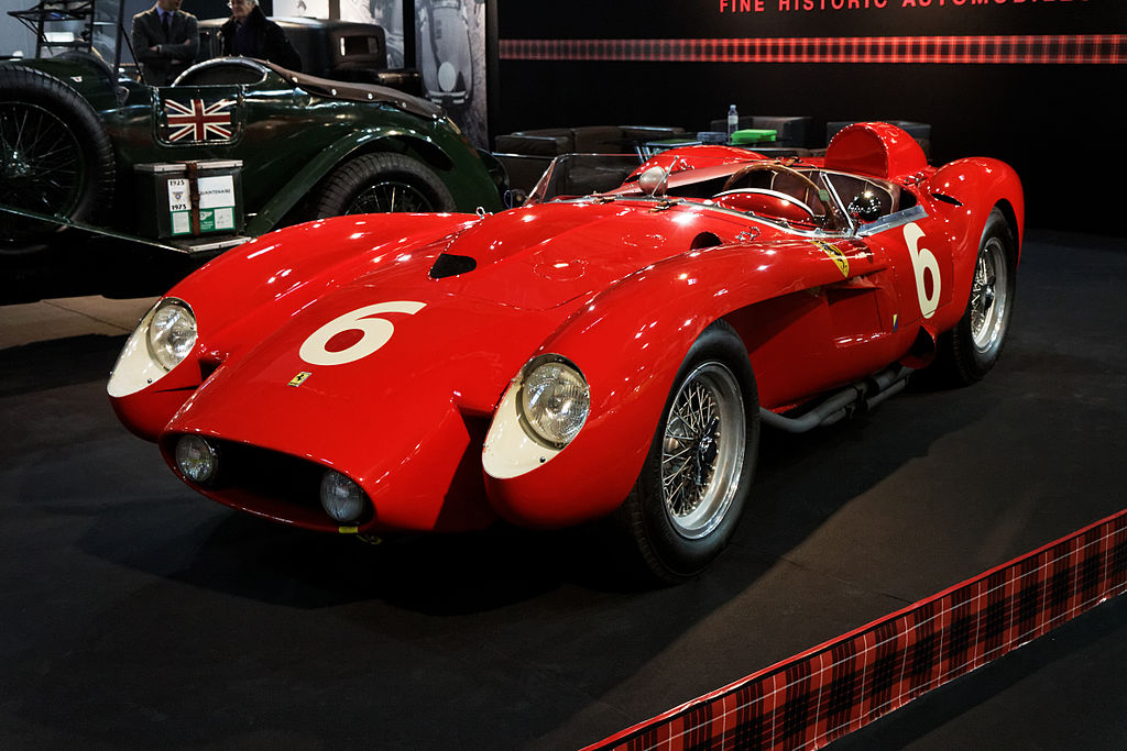A close-up photo of a Ferrari 250 Testa Rossa car on display at an exhibition