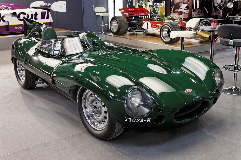 A close-up photo of a Jaguar D-Type car on display at an exhibition