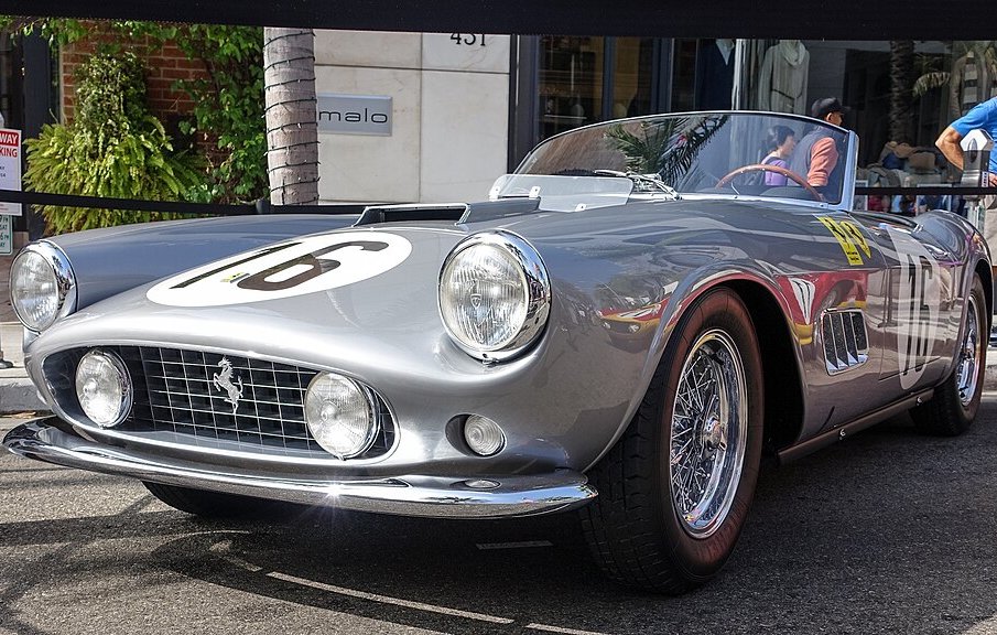 Ferrari 250 GT LWB California Spyder Competizione car on display at an exhibition