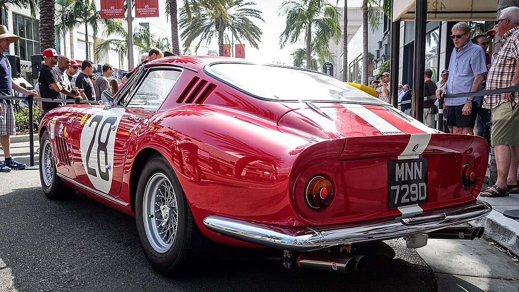A close-up photo of a Ferrari 275 GTB C car on display at an exhibition