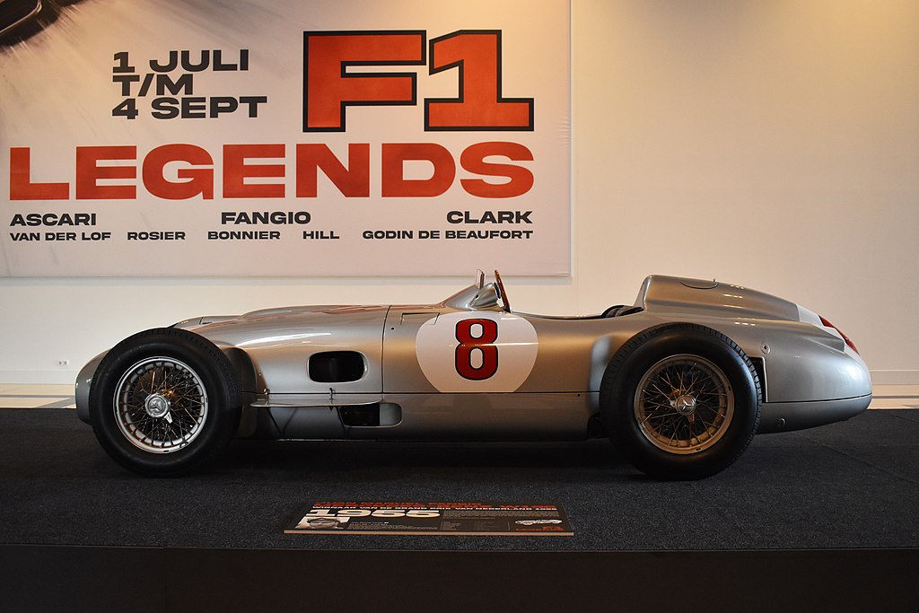 A close-up photo of a Mercedes-Benz W196 car on display at an exhibition