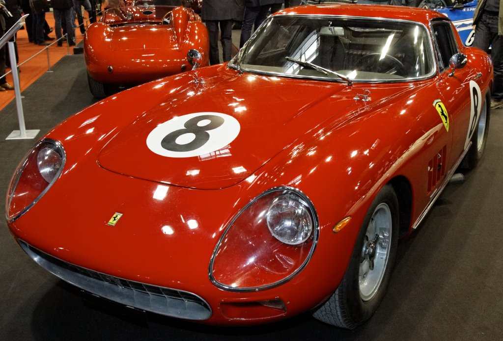 A close-up photo of a Ferrari 275 GTB/C Speciale car on display at an exhibition