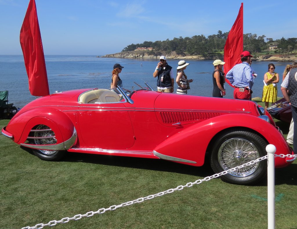 Alfa Romeo 8C 2900B Lungo Spider car on display at an exhibition