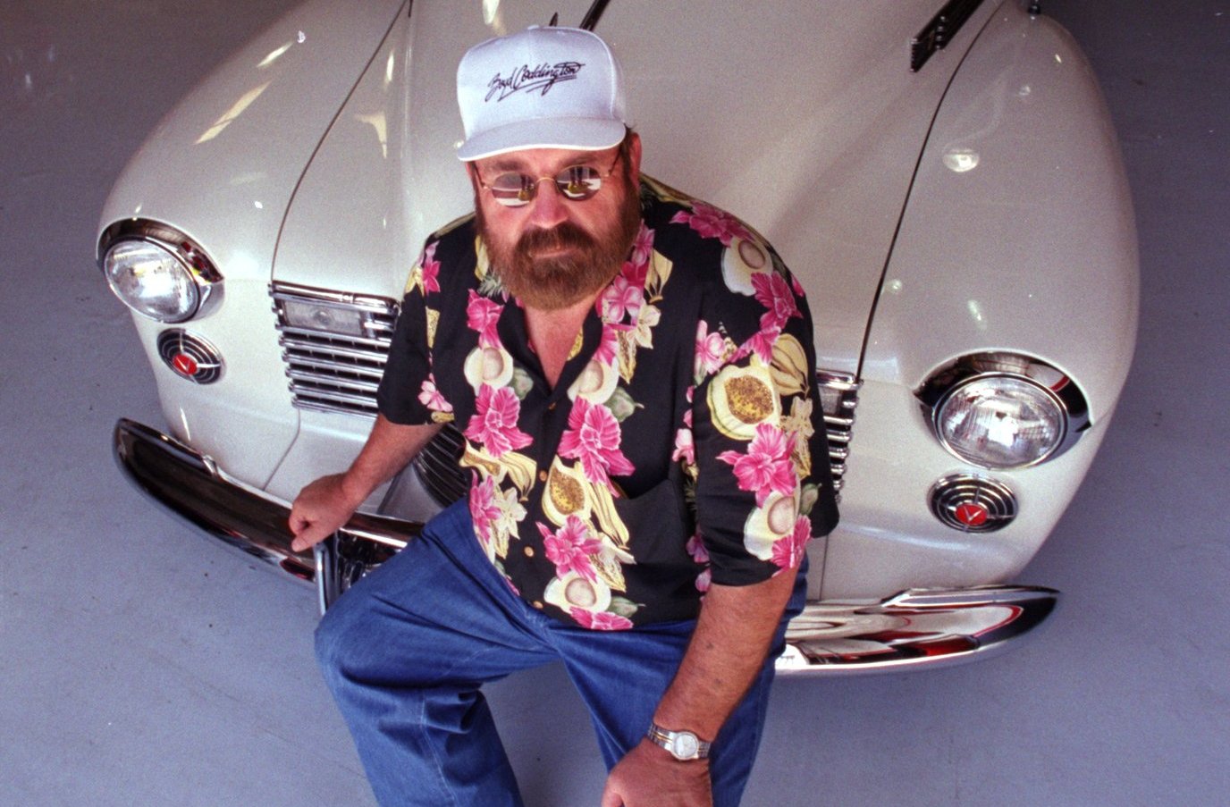 Boyd Coddington next to a customer's 1941 Cadillac