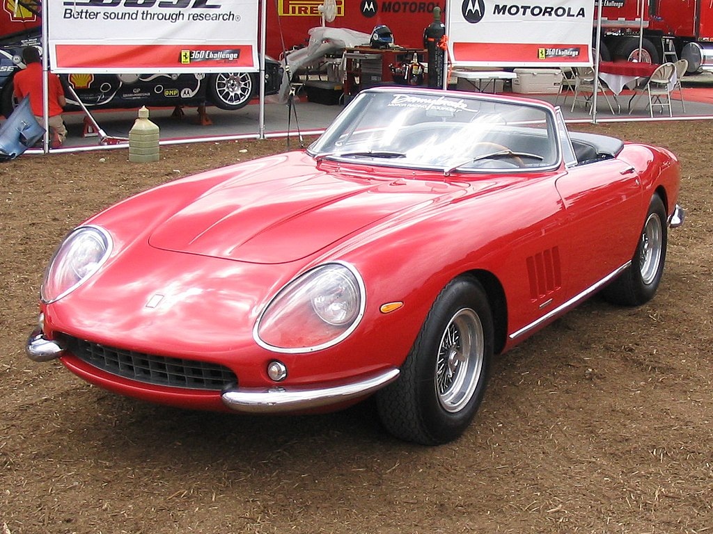 1967 Ferrari 275 GTB/4 NART Spyder car on display at an exhibition