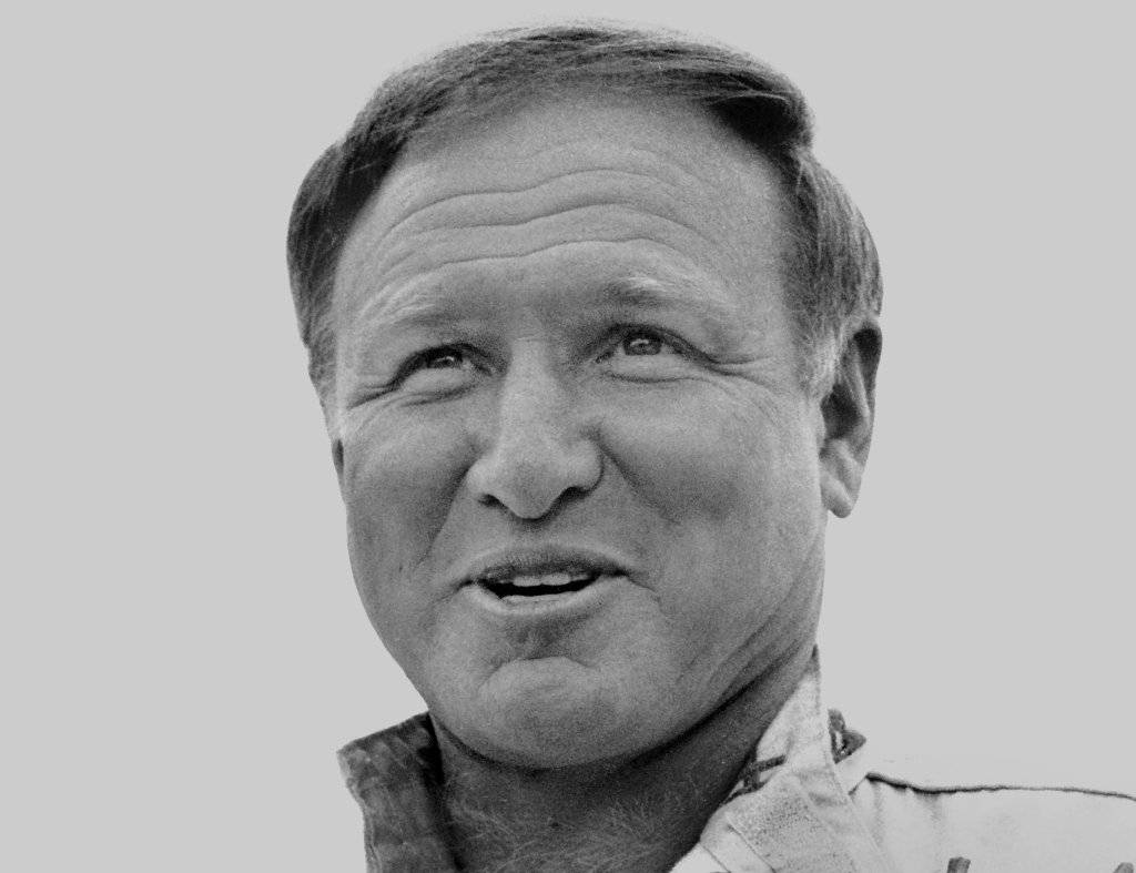 Cale Yarborough stands beside his race car prior to the start of the 1984 Daytona 500