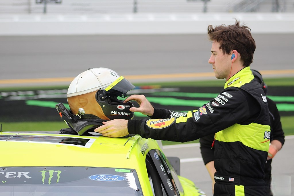 Ryan Blaney next to his car.
