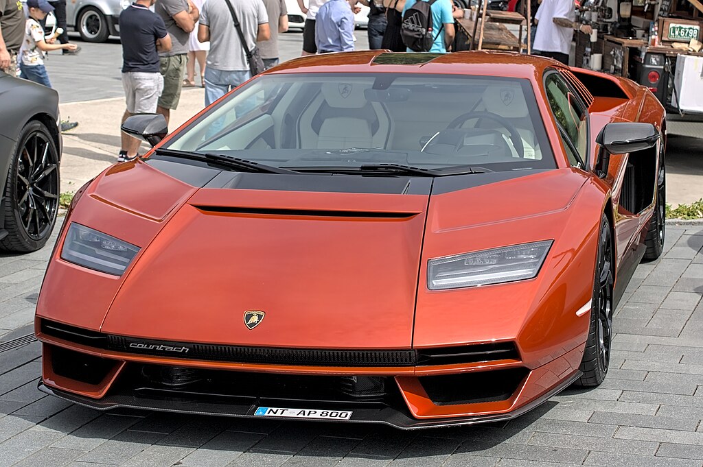 A close-up photo of a Lamborghini Countach car on display at an exhibition