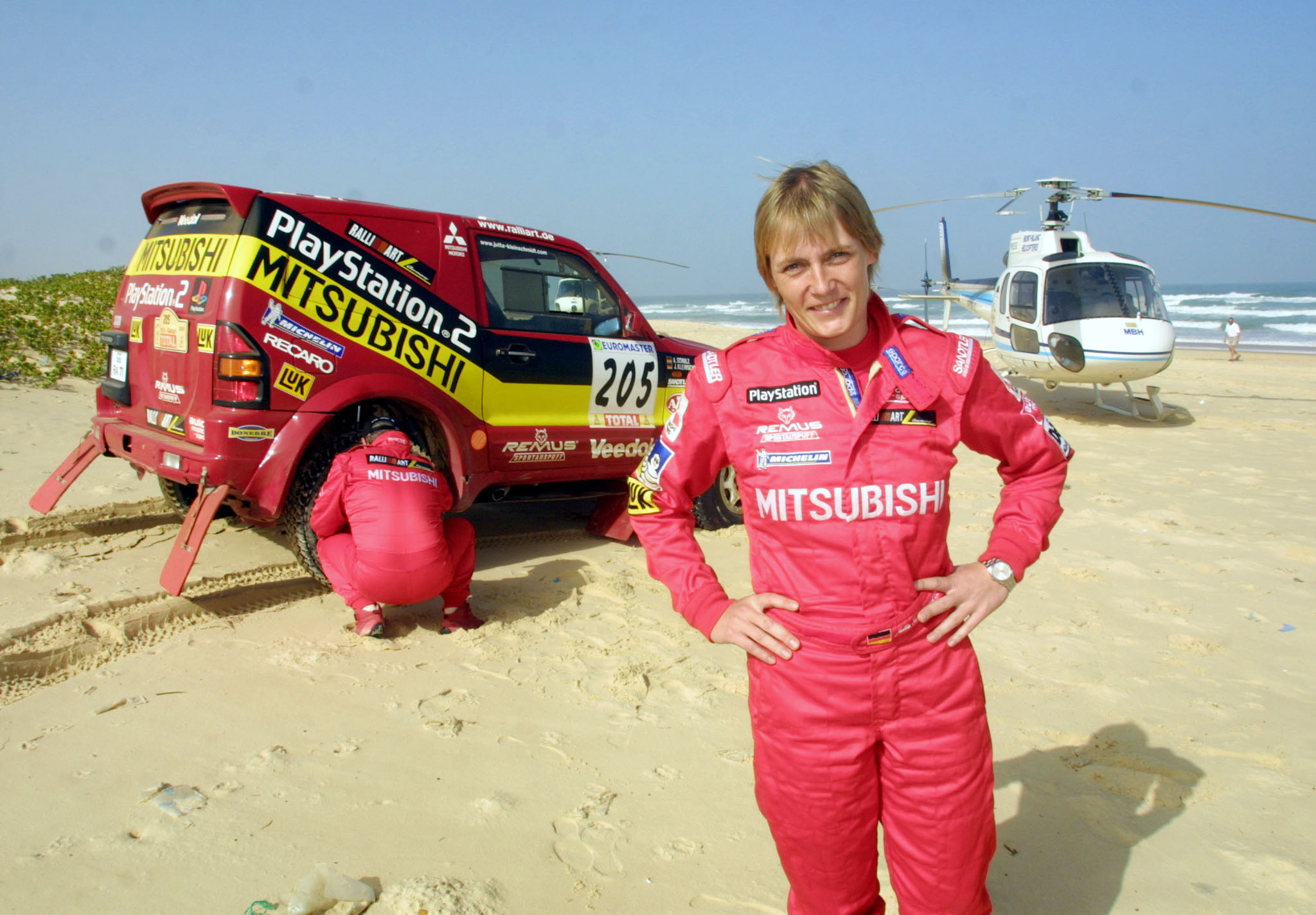 Germany's Jutta Kleinschmidt on the beach after she became the first woman to win the gruelling Paris-Dakar