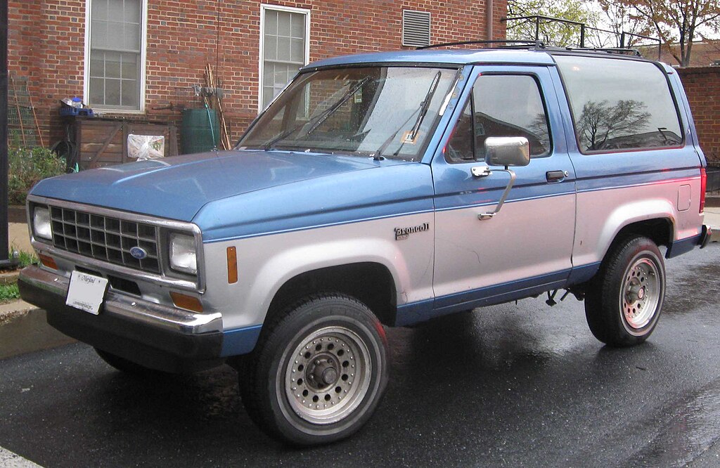 A close-up photo of a Ford Bronco II car parked in a parking lot