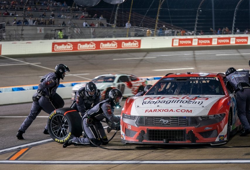 NASCAR Cup Series driver, TODD GILLILAND and crew make a pit stop