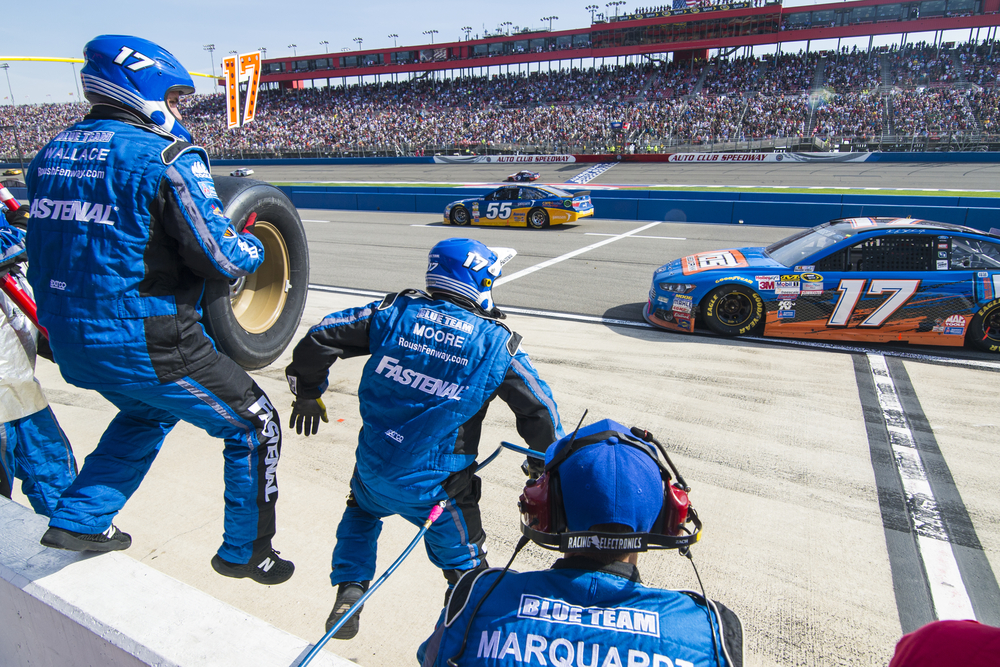 Ricky Stenhouse Jr. (17) comes in for service during the Auto Club 400 race
