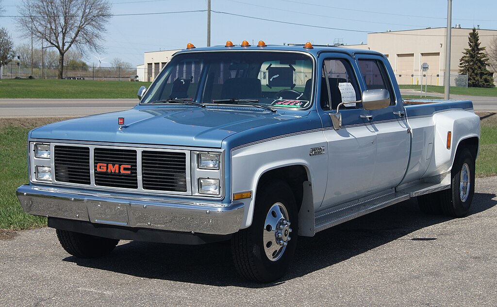 A close-up photo of a Chevrolet C/K car parked in a parking lot