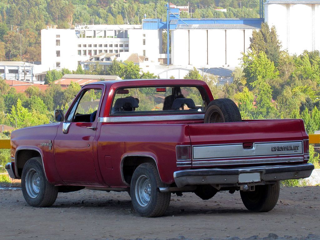 A close-up photo of a Chevrolet C/K car parked in a parking lot