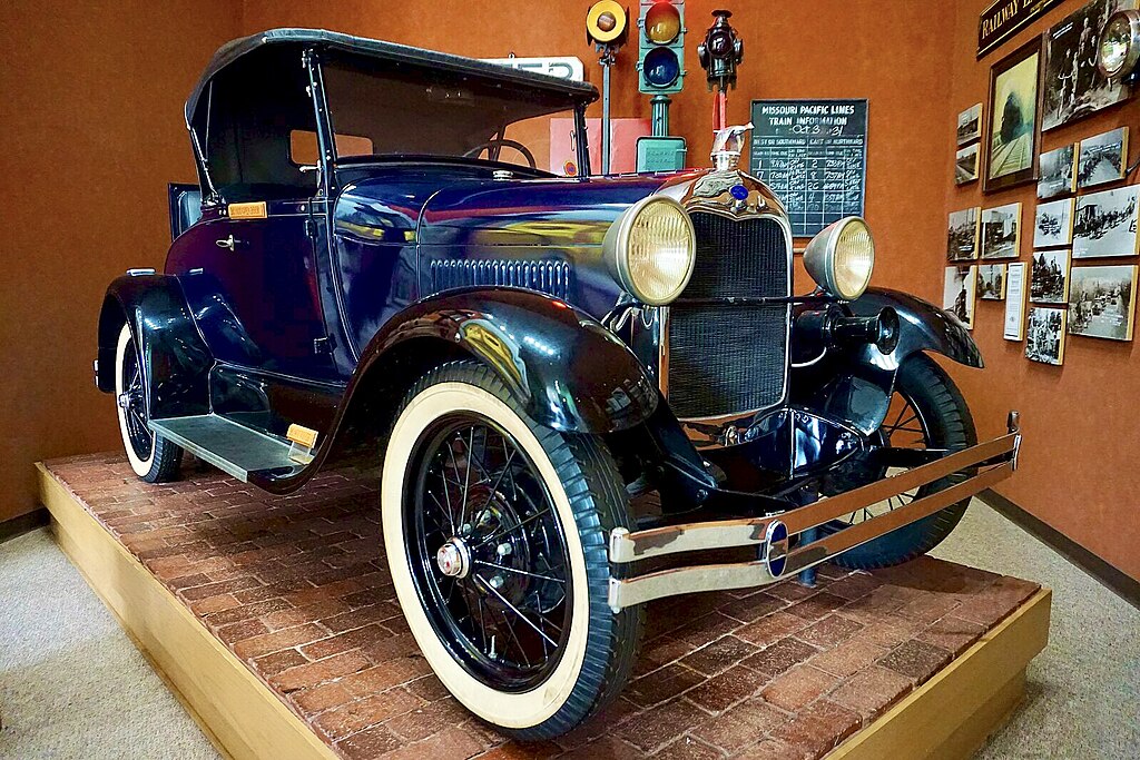A close-up photo of a Ford Model A car on display at an exhibition