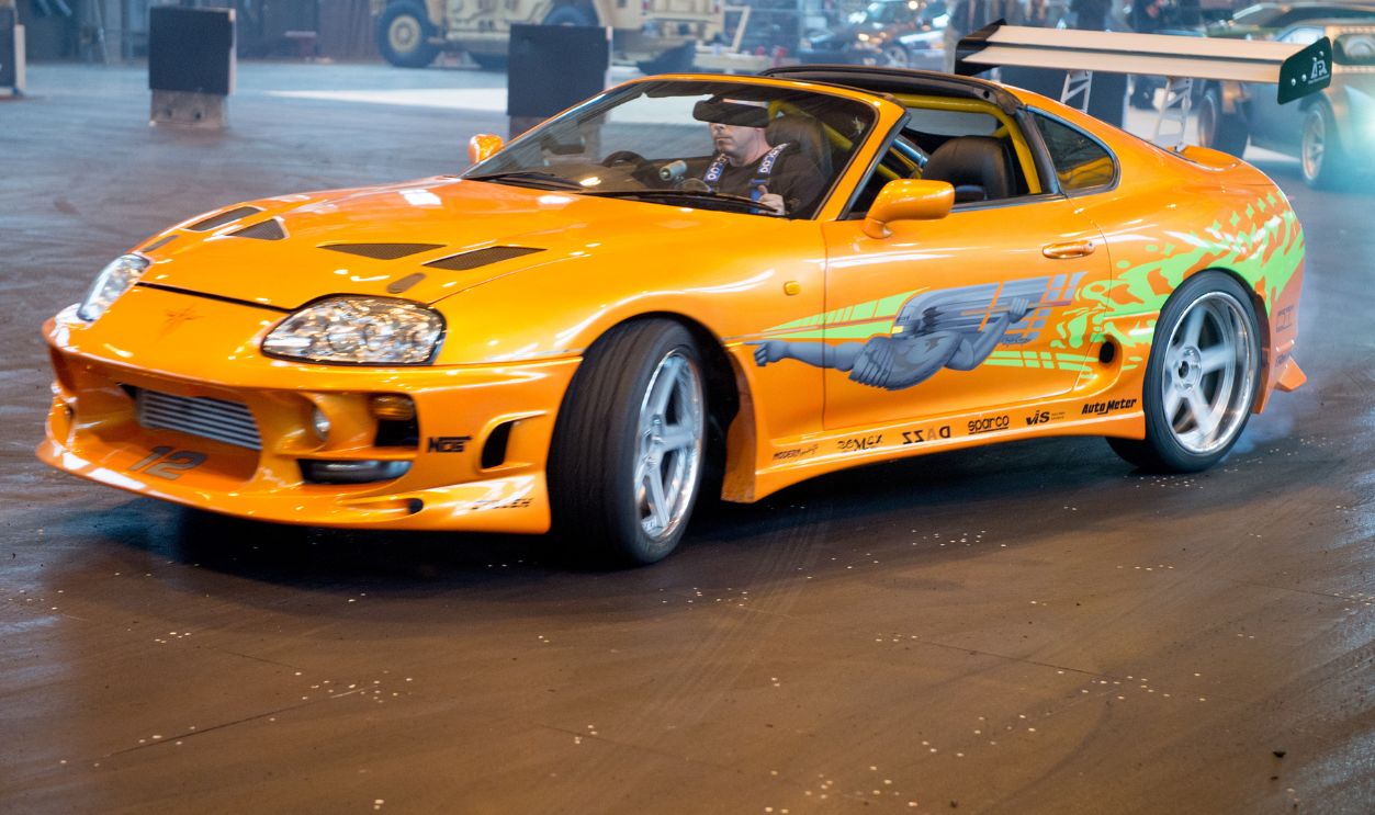 UNITED KINGDOM - SEPTEMBER 21: A 1994 Toyota Supra MK IV used on screen by Paul Walker in The Fast and the Furious (2001) during the 'Fast & Furious Live' media launch day event which featured the most screen used Fast and Furious cars ever in one place, on September 21, 2017 at the Fast & Furious 'Fast Camp' live rehersal space in Leicestershire, England.