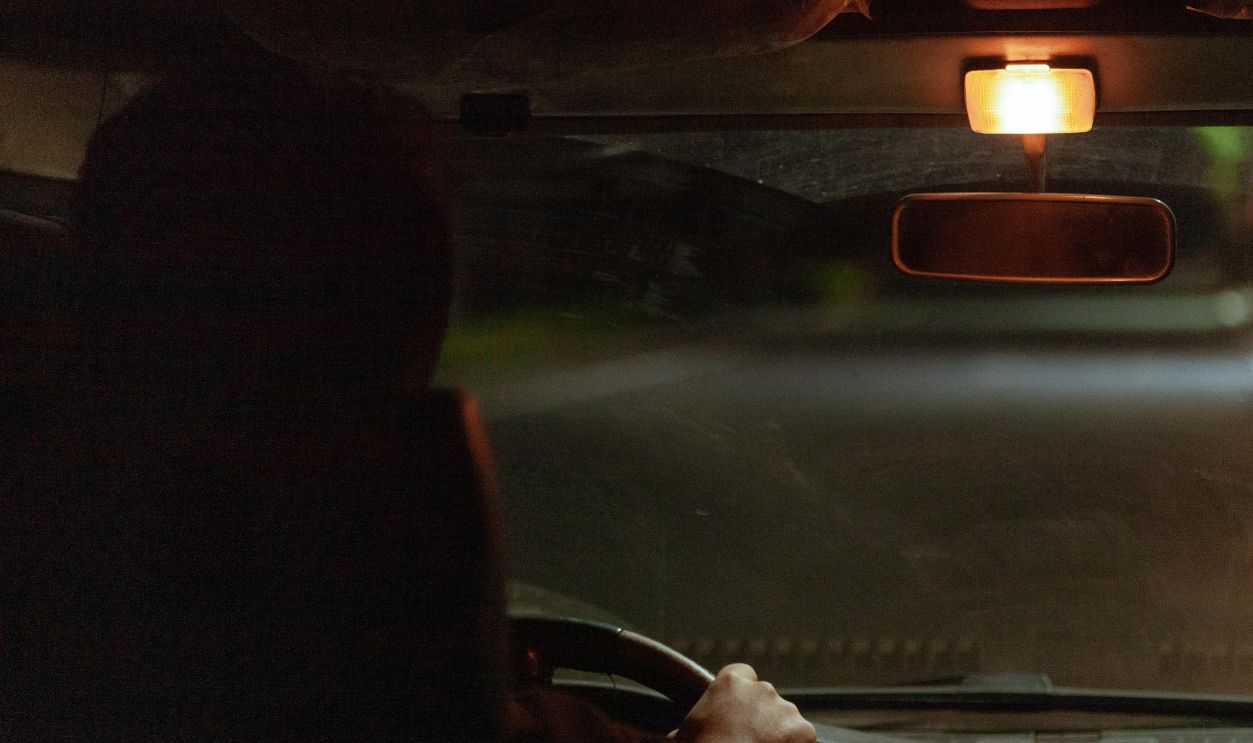Person driving at night