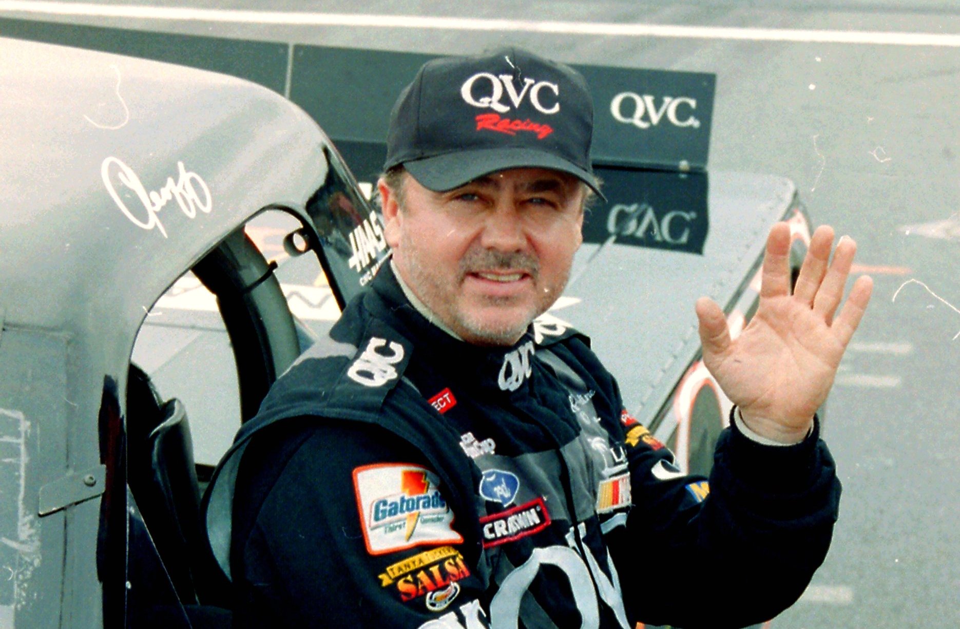 NASCAR driver Geoff Bodine waving