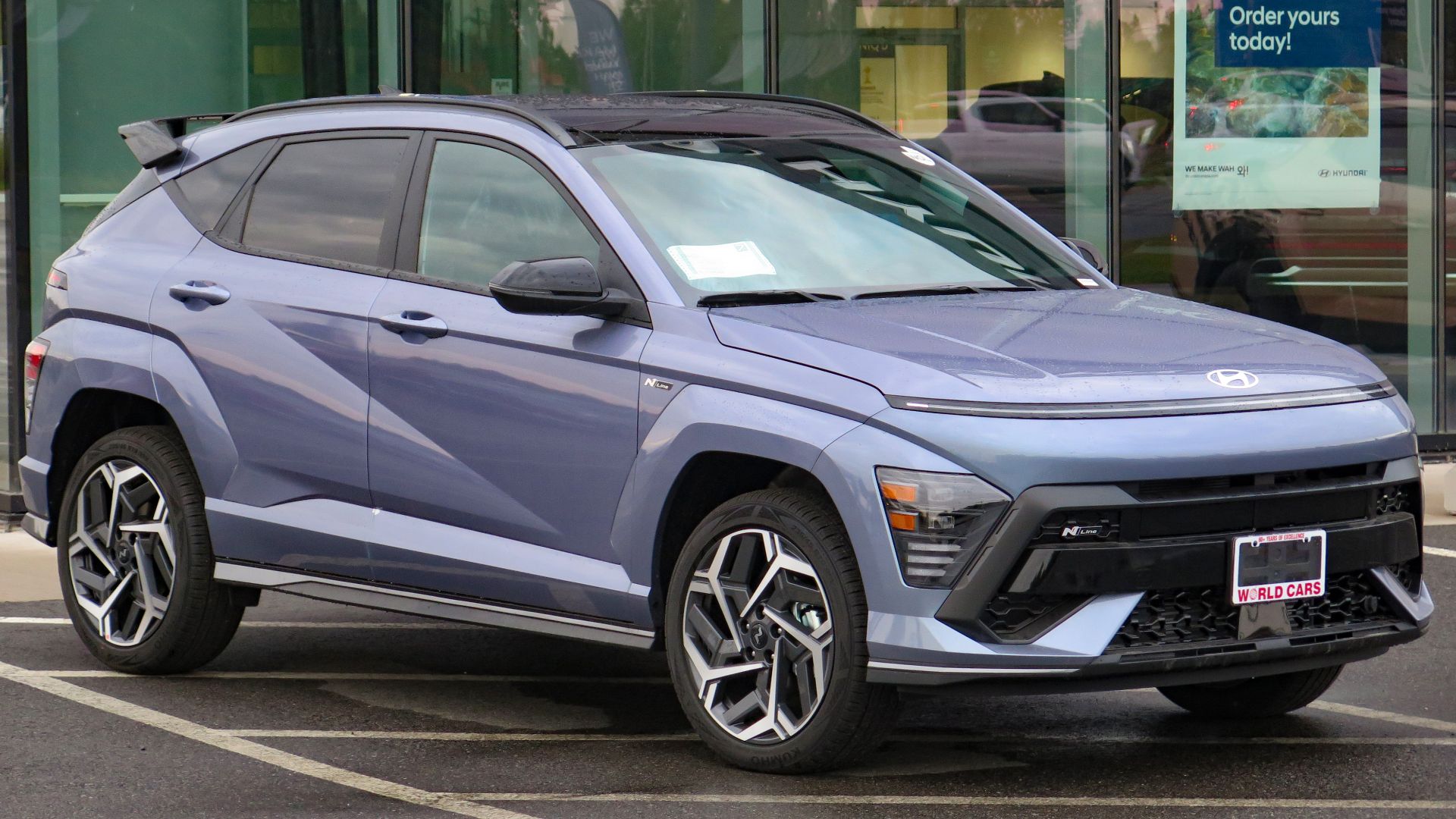 File:2024 Hyundai Kona N Line AWD in Meta Blue, Front Right, 09-30-2023.jpg