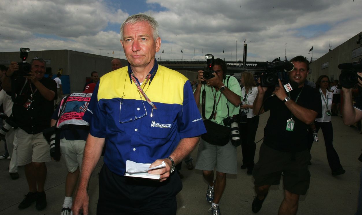 Nick Sherrock of Michelin walks through the paddock after team meeetings were held to decide whether the race would go ahead during the United States F1 Grand Prix at the Indianapolis Motor Speedway on June 19, 2005 in Indianapolis, Indiana