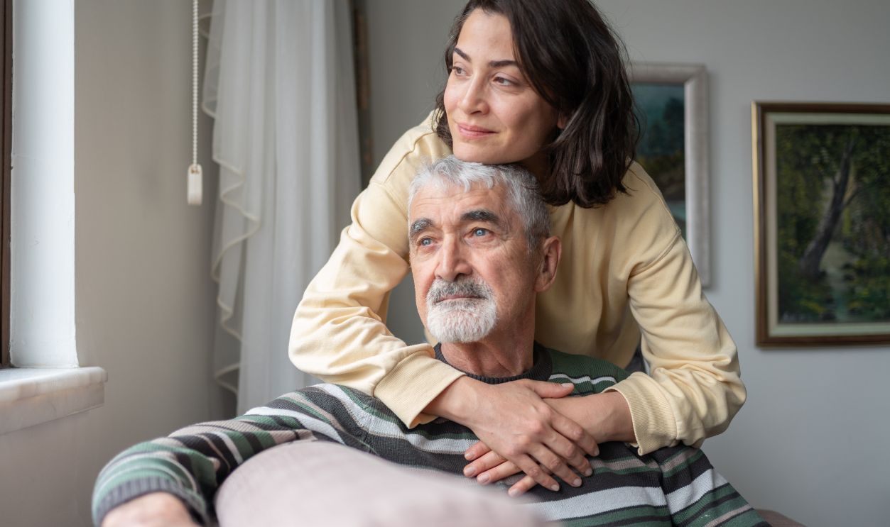Daughter Hugging Senior Father For Love Bonding Together