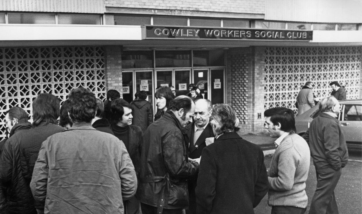 British Leyland engine tuners outside the Cowley Workers Social Club before a meeting to discuss continued strike action at the British Leyland car plant in Cowley, Oxford, 16th January 1975. The 250 engine tuners later voted narrowly to stay on strike