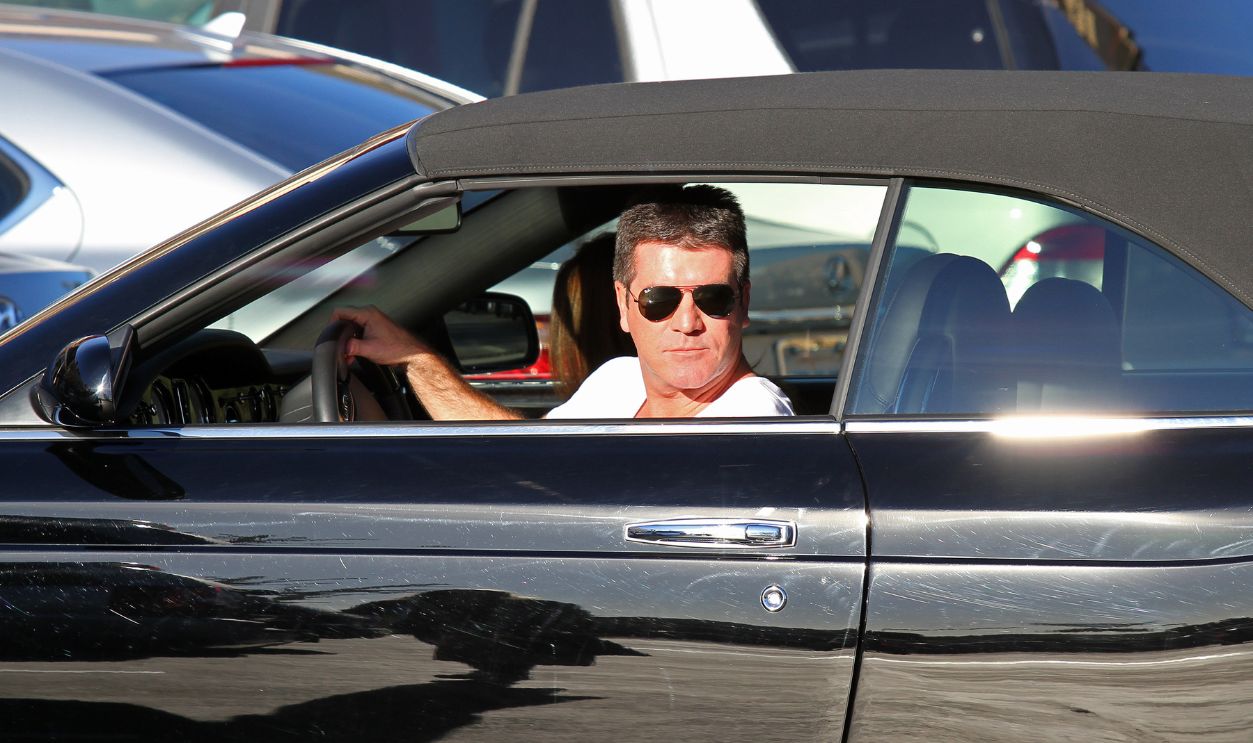Gettyimages - 	97707441, Celebrity Sightings In Los Angeles - March 14, 2010 LOS ANGELES, CA - MARCH 14: Simon Cowell and fiancée Mezhgan Hussainy shop on March 14, 2010 in Malibu, California.