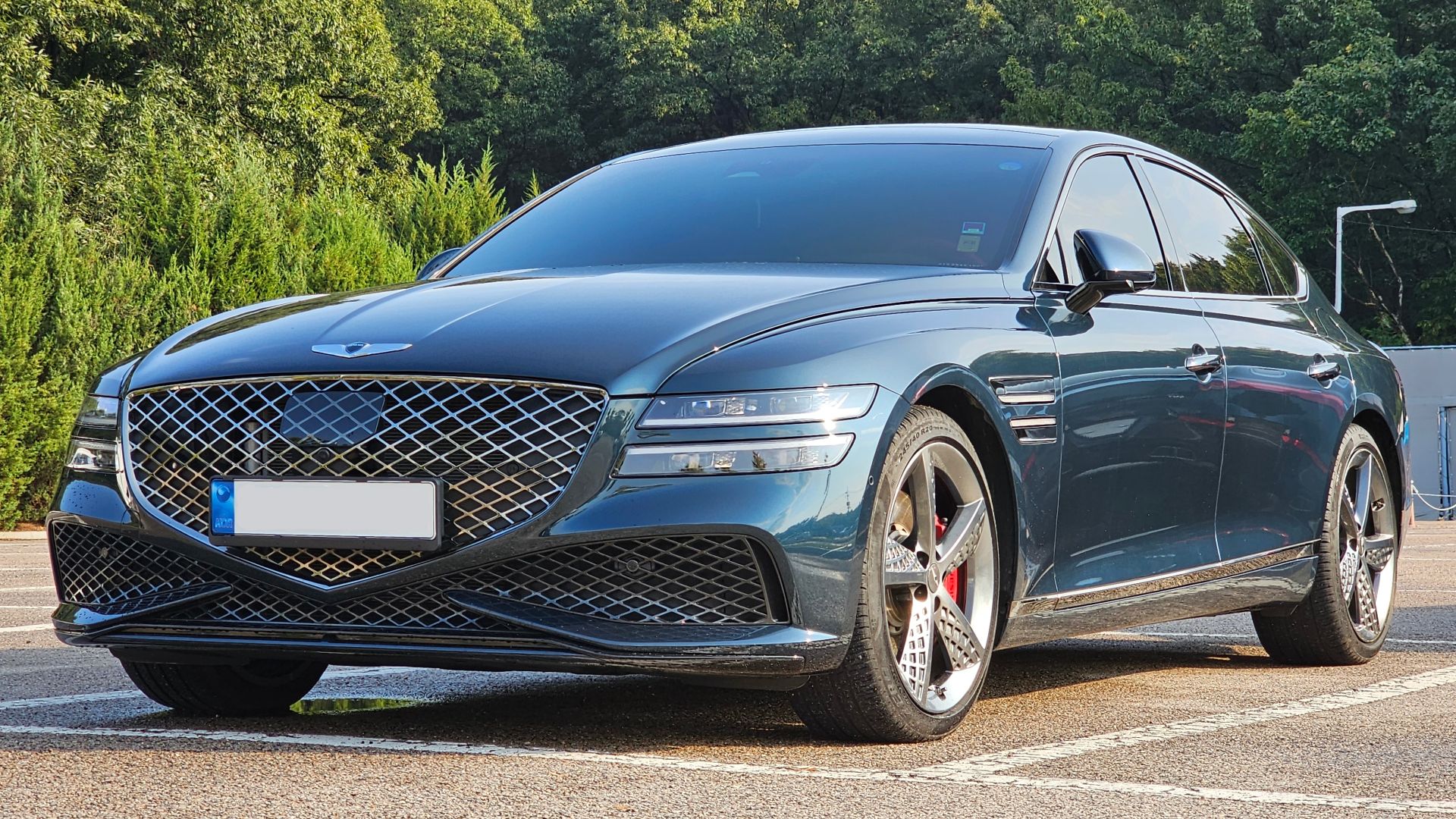 File:Genesis G80 Sport RG3 Tasman Blue (15).jpg