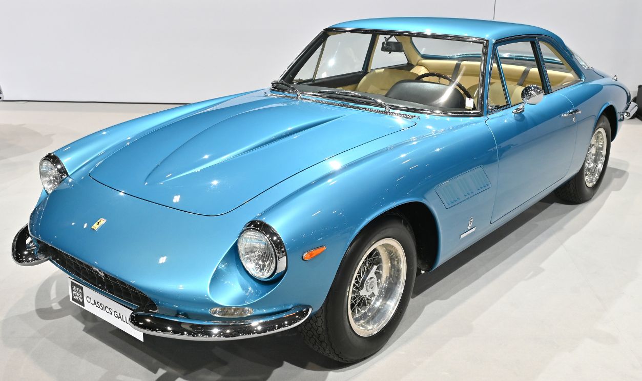 A blue 1964 Ferrari 500 Superfast vintage car is displayed in the Classics Gallery during the Geneva Motor Show 2024 at Palexpo on February 26, 2024 in Geneva, Switzerland. Celebrating the 100th anniversary of GIMS as an international event, the “100 years of icons” exhibition features 40 truly iconic cars that made automotive history and the world stand up. The 2024 Geneva Motor Show opens today for the first time in five years. The event last took place in 2019 with the coronavirus pandemic forcing organisers to cancel the 2020 show just days before the show was due to open. This year’s Show will be a smaller affair with just four major manufacturers confirmed to attend.
