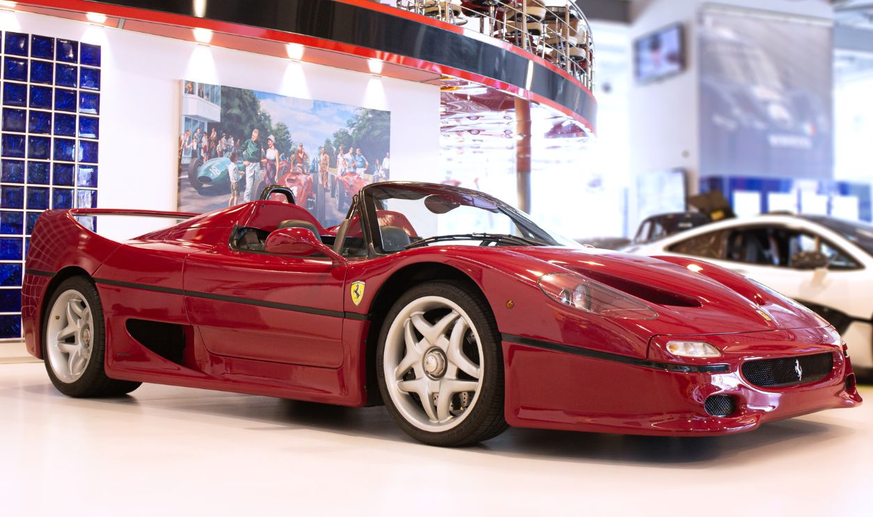 The Ferrari F50 at Joe Macari Performance Cars in Wandsworth, London. Only 8 F50's were produced in Rosso Barchetta, a deeper red from the common Ferrari colour, Rosso Corsa.