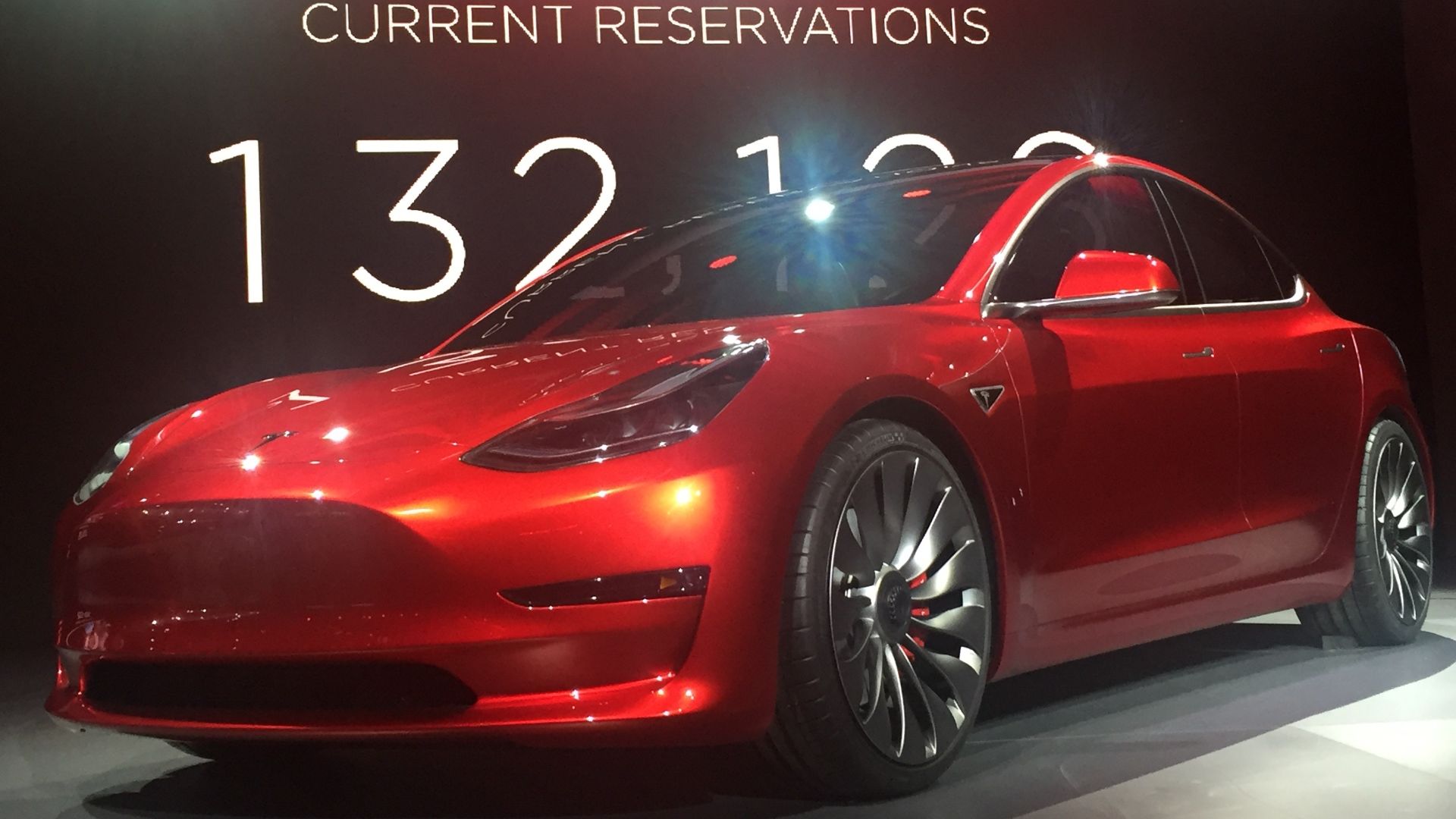 File:Candy Red Tesla Model 3.jpg