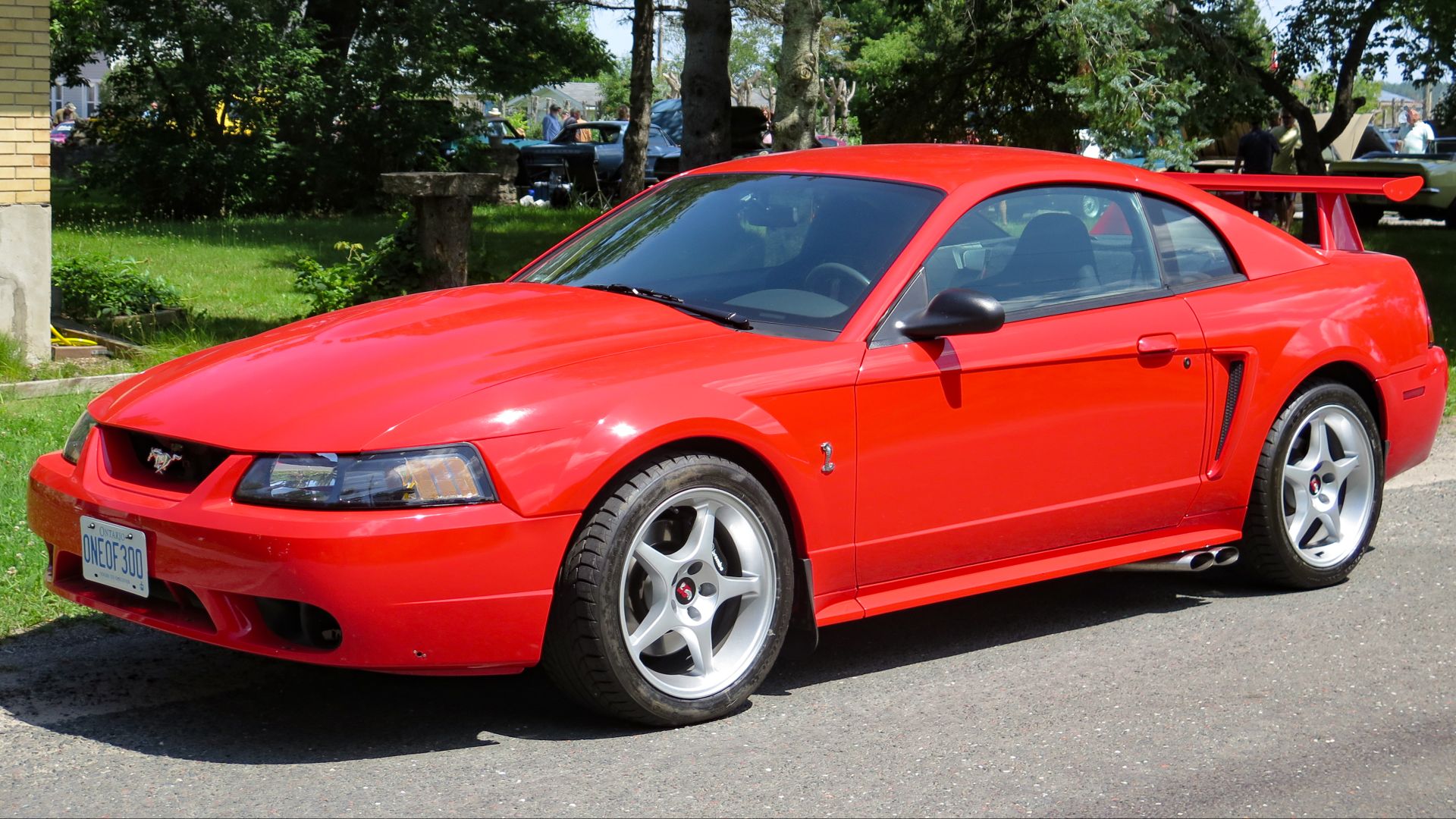 File:2000 Ford Mustang SVT Cobra R in Performance Red, Front Left (Hilton Beach 2023).jpg