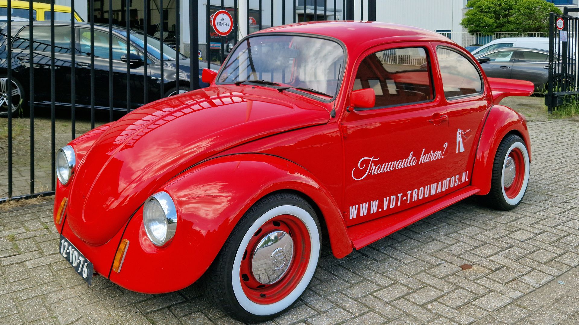 File:Red Volkswagen Beetle three-quarter front view.jpg